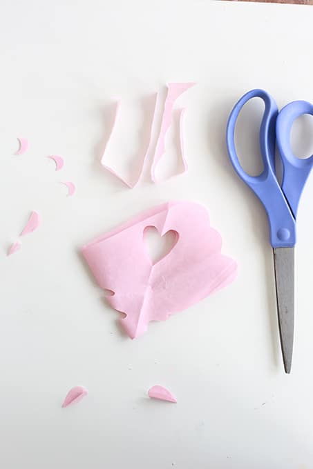 Cutting hearts in tissue paper