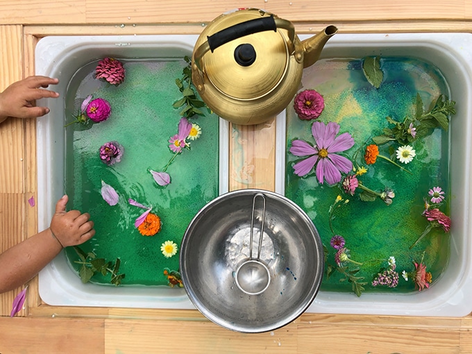 Water play with flowers and tea pot
