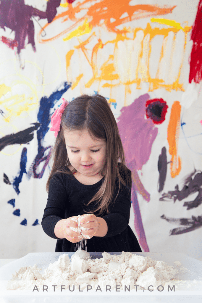 Girl playing with cloud dough_photo by Jean Van't Hul
