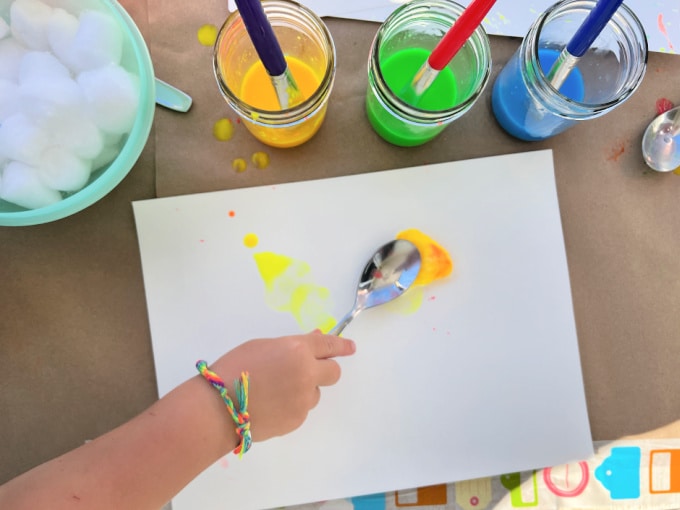 splat painting with spoon