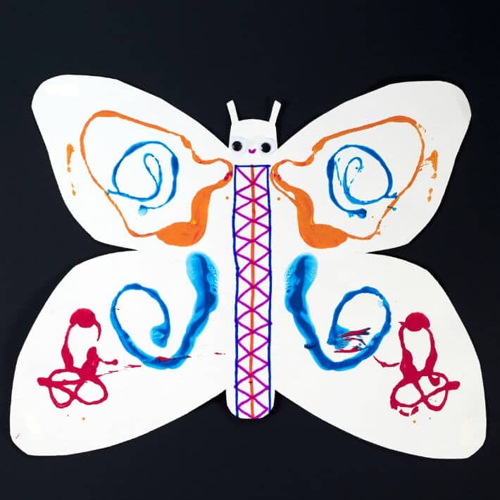 A Butterfly Art Project For Kids With String Symmetry Printing