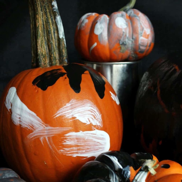 Painting Pumpkins With Kids Is The Perfect Halloween Sensory Activity