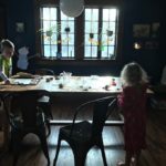 Kids making eco friendly christmas decorations together