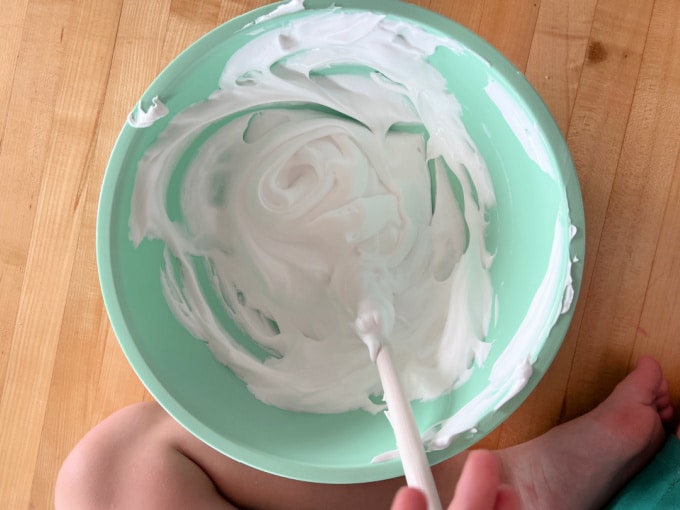 mixing cream and glue for slime