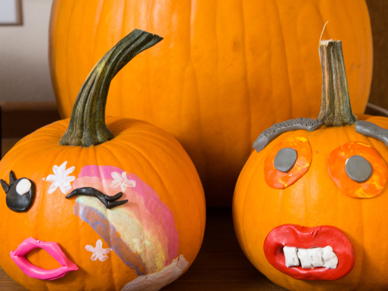 clay faces on pumpkin