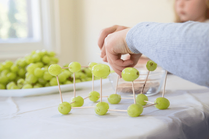 grape and toothpick sculpture