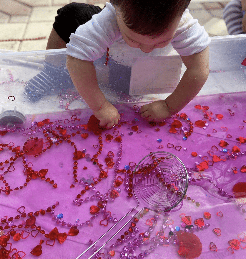 hearts water play valentine sensory bin by redviolet studio