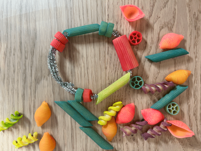 A dyed pasta bracelet for mother's day crafts for preschoolers