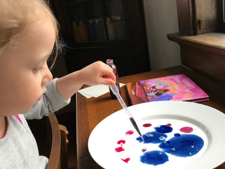 dropping color onto milk