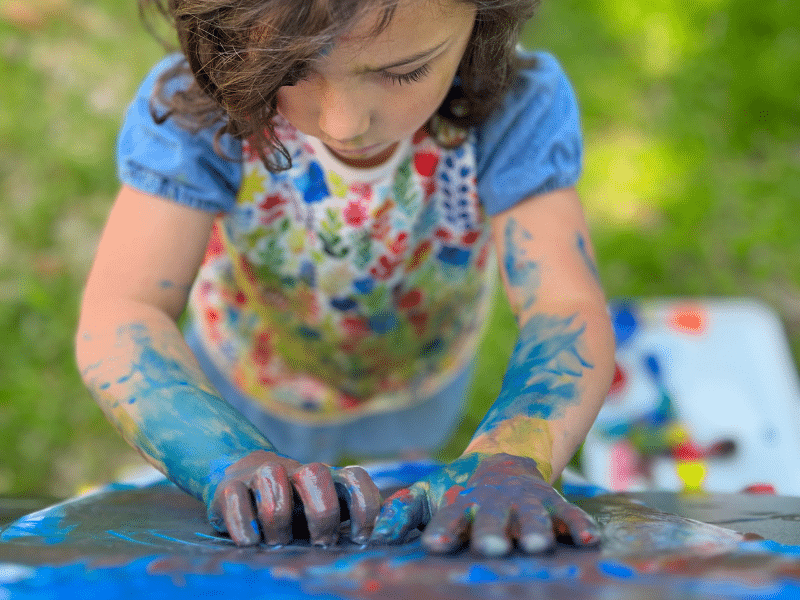 Child finger painting
