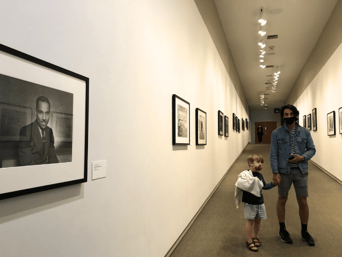 child visiting teenie harris at the carnegie museum of art
