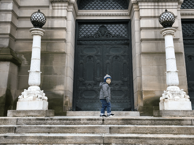 child outside art museum