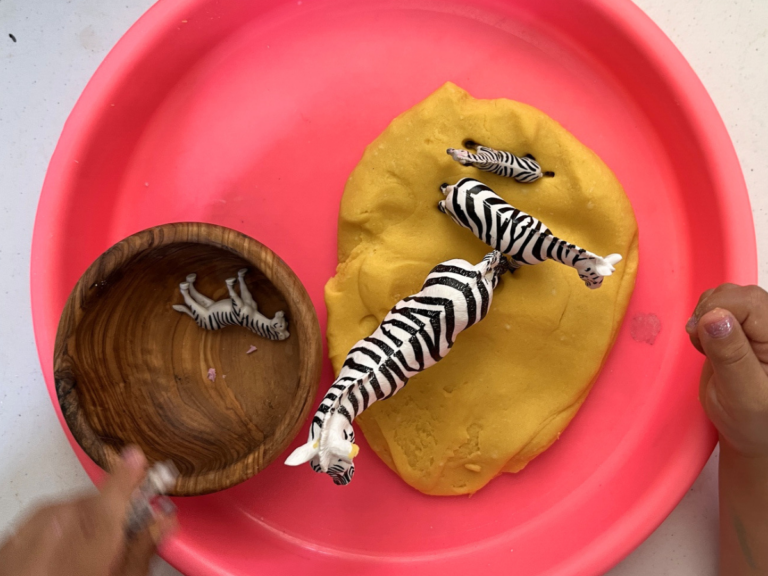 playdough and toy zebras