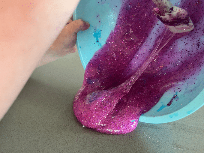 pouring out glitter slime