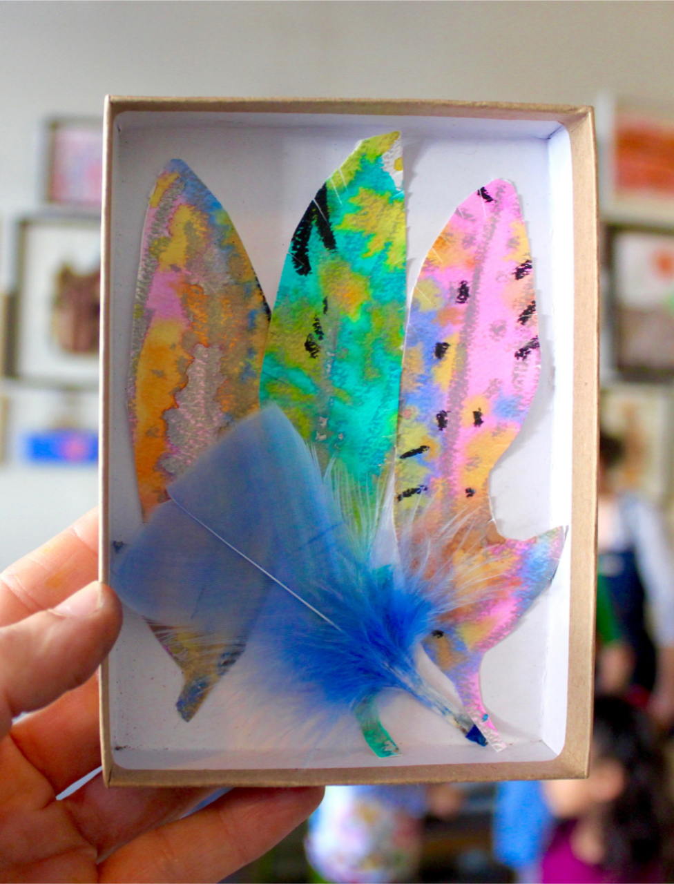 feather art in a box
