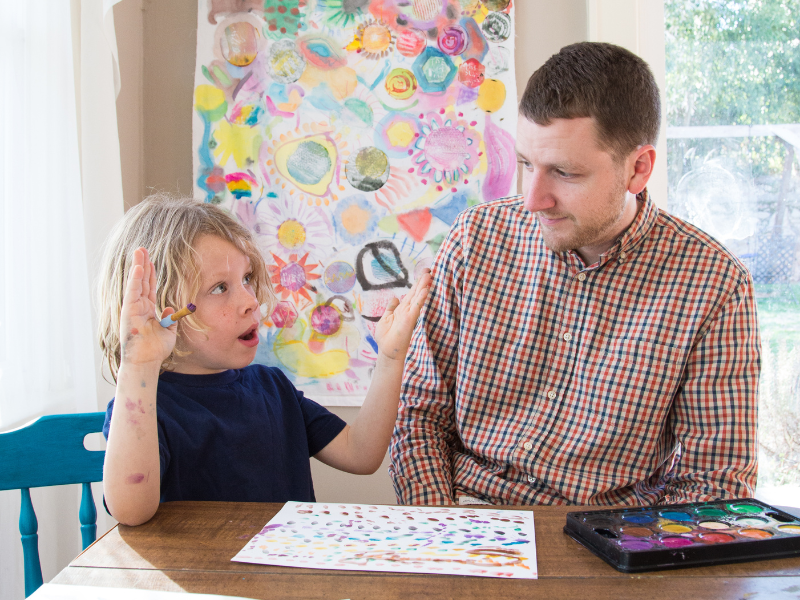 father and child painting together-2