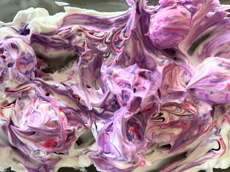 eggs in pink marbled shaving cream