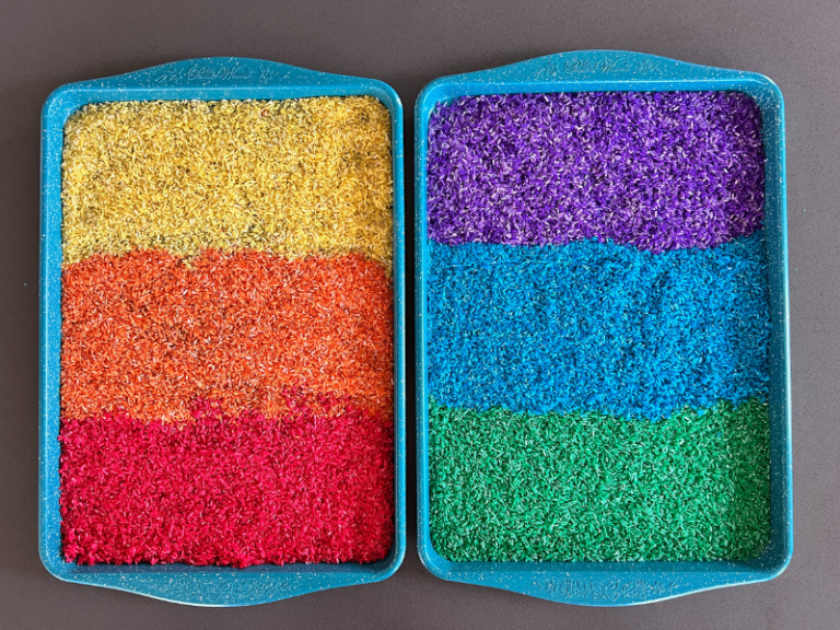 rainbow rice on cookie sheets