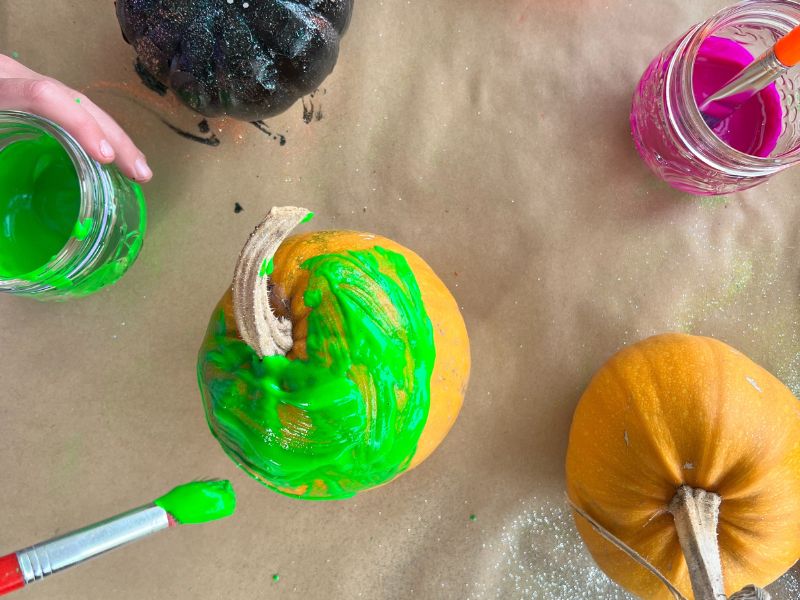 painting pumpkin green