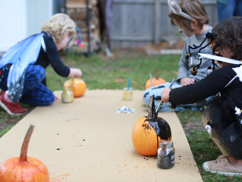 pumpkin painting on lawn