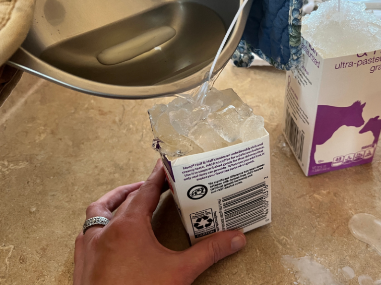 pouring wax into carton